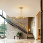 Lustre à 12 lumières en forme de roue de chariot, style moderne du milieu du siècle, en verre transparent, doré/noir, grand modèle