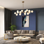 Lustre linéaire moderne du milieu du siècle de 40 po, suspension Spoutnik à 16 ampoules en laiton doré avec globe en verre dépoli pour salle à manger