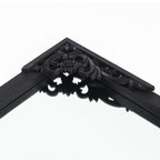 Miroir de sol sculpté en bois massif de forme arquée sur toute la longueur