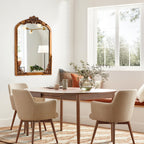 Miroir de sol sculpté en bois massif de forme arquée sur toute la longueur